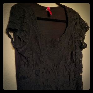 Universal Fashion black lace cap sleeve shirt.